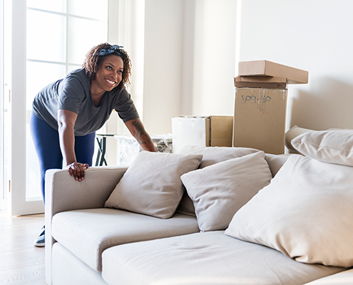 Young woman moving into new home